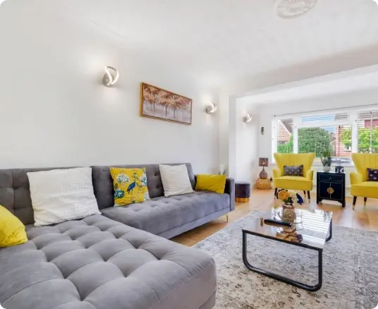 Modern living room with grey corner sofa