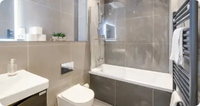 Modern bathroom with grey tiles